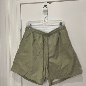 Men’s light green swim or athletic shorts